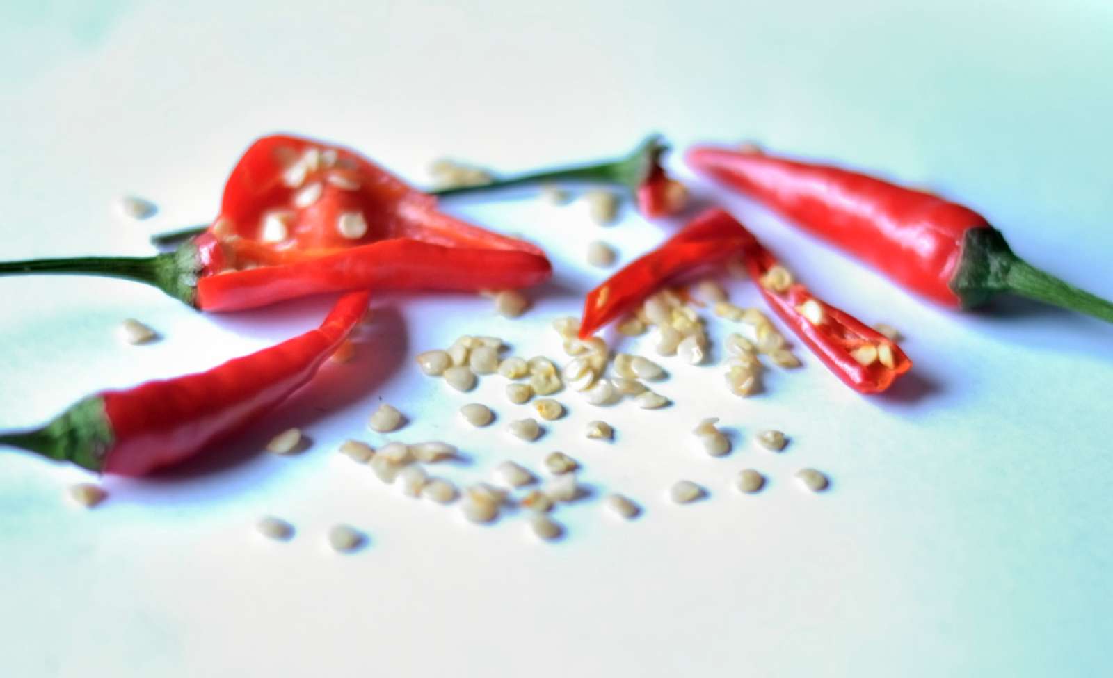 Removing seeds from Thai chillies